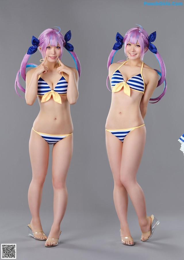 A woman in a bikini posing for a picture.